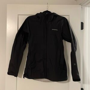 Black Patagonia rain jacket